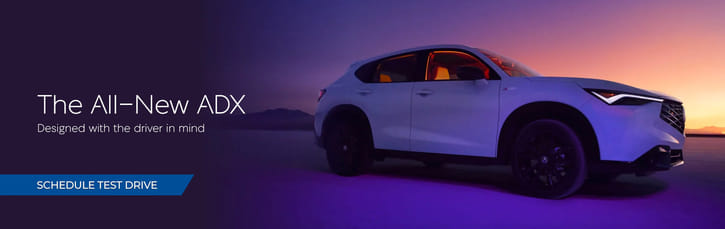 Image of the 2025 Acura ADX, showcasing its sleek design and modern features in a vibrant setting.