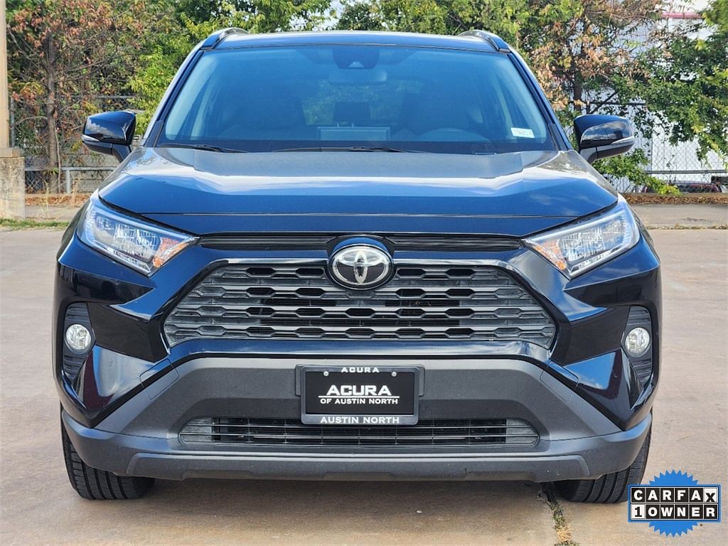 Used 2019 Toyota RAV4 XLE with VIN JTMW1RFV9KD506761 for sale in Austin, TX