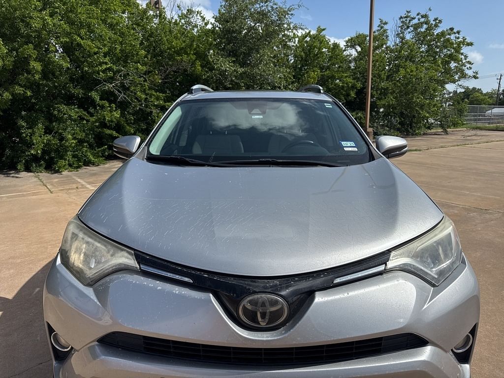 Used 2016 Toyota RAV4 XLE with VIN 2T3WFREVXGW277875 for sale in Austin, TX