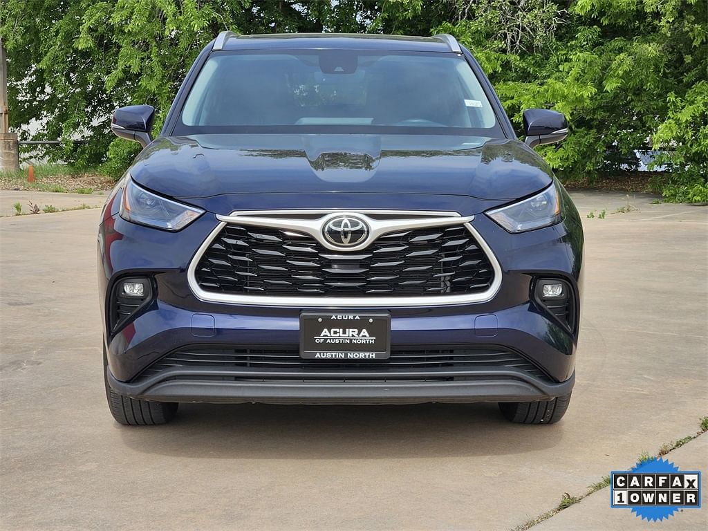 Used 2023 Toyota Highlander XLE with VIN 5TDKDRBH4PS033045 for sale in Austin, TX