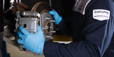 Mechanic working on brakes