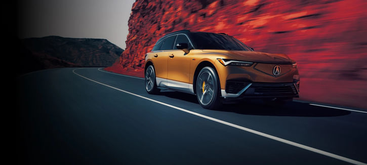 Acura 2025 ZDX Type S on the road in Tiger Eye Pearl