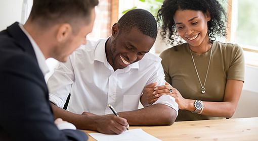 Man signing documents