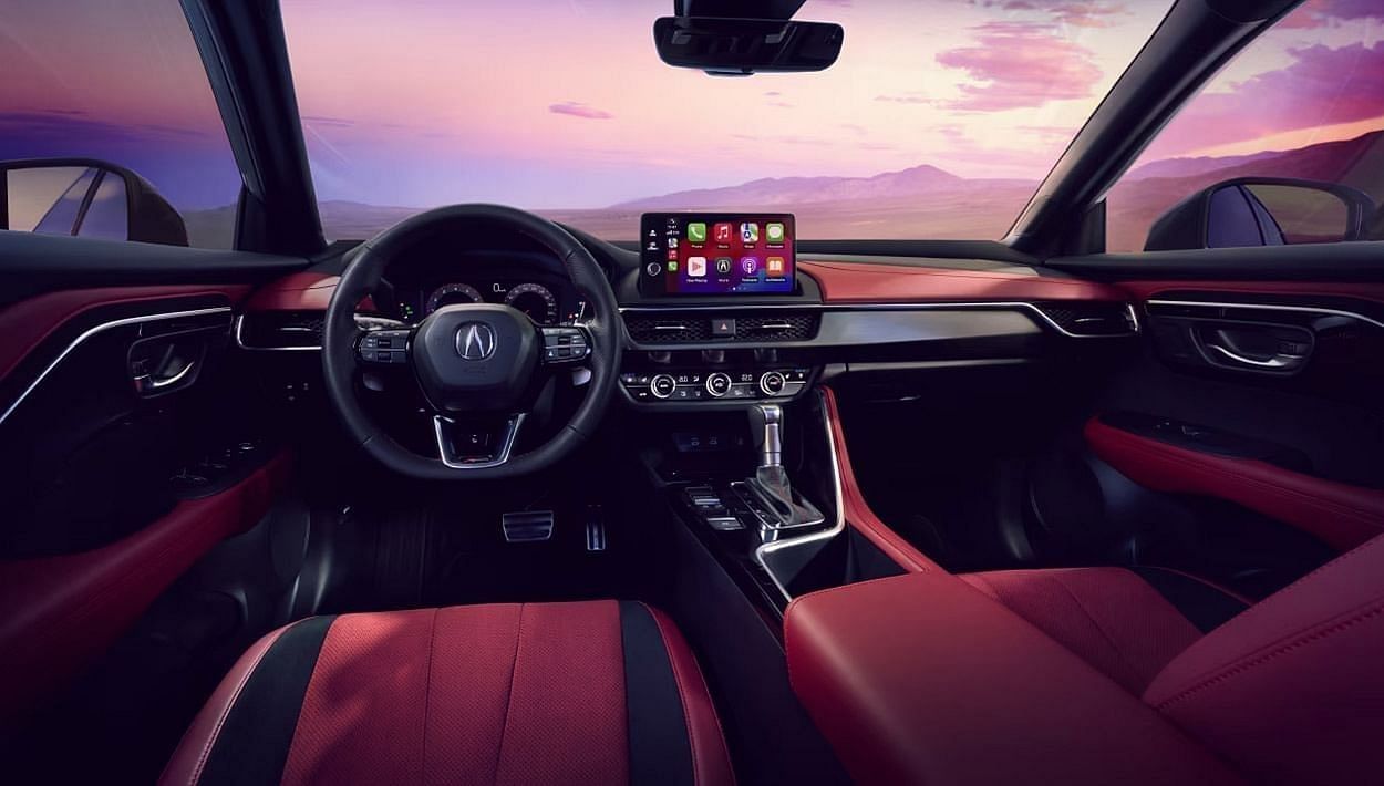 Interior view of a 2025 Acura ADX, showcasing modern dashboard, seating, and controls in a sleek design.