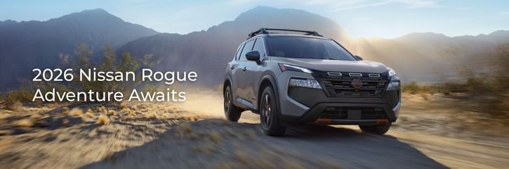 The 2026 Nissan Rogue tackles a dirt road with ease, combining rugged capability with modern elegance for any adventure.