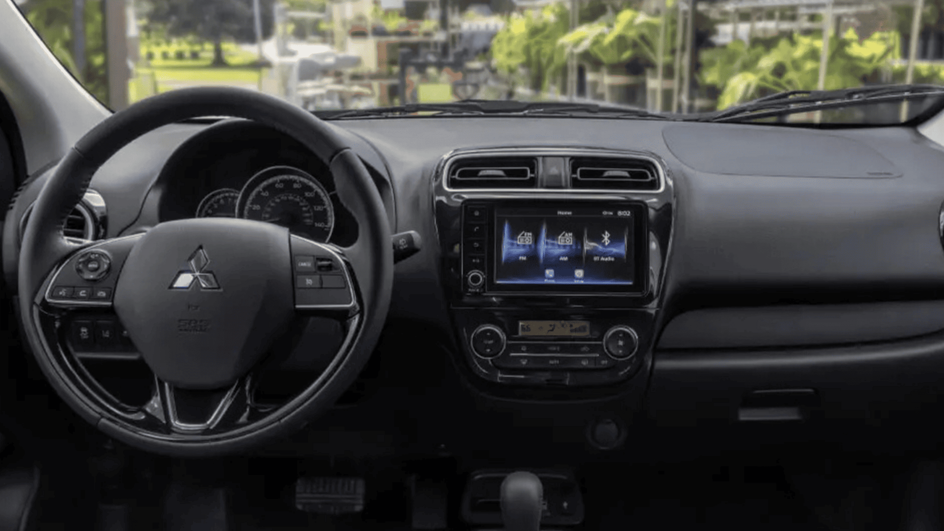 2024 Mitsubishi Mirage dashboard with touchscreen and steering wheel in Brandon, FL