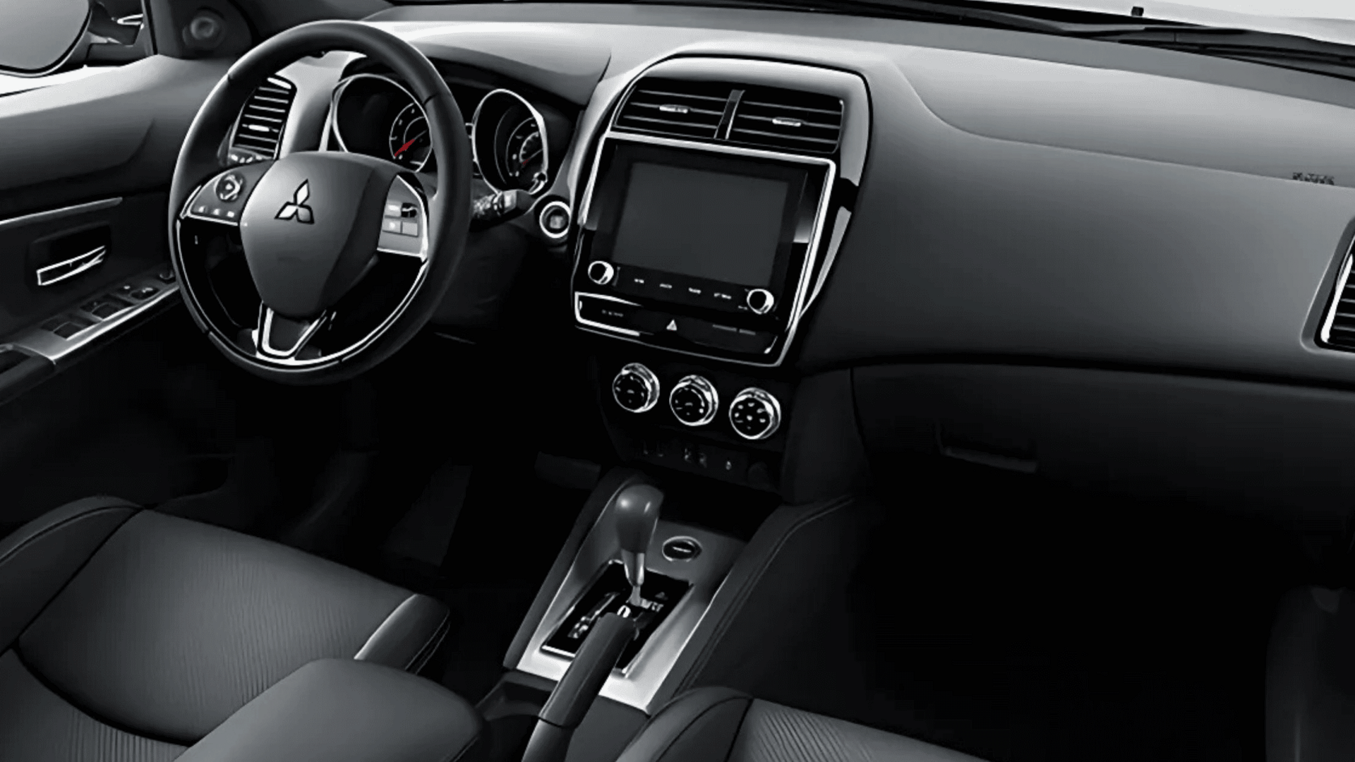 2024 Outlander Sport dashboard with steering wheel and touchscreen display