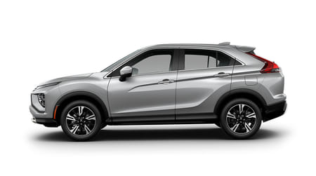 Driver side view of a silver 2026 Eclipse Cross on a white background.