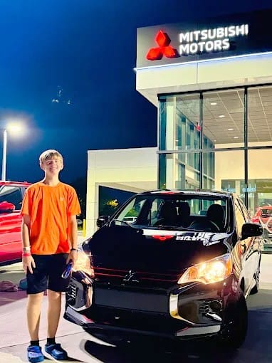 Happy Tampa customers with their used car