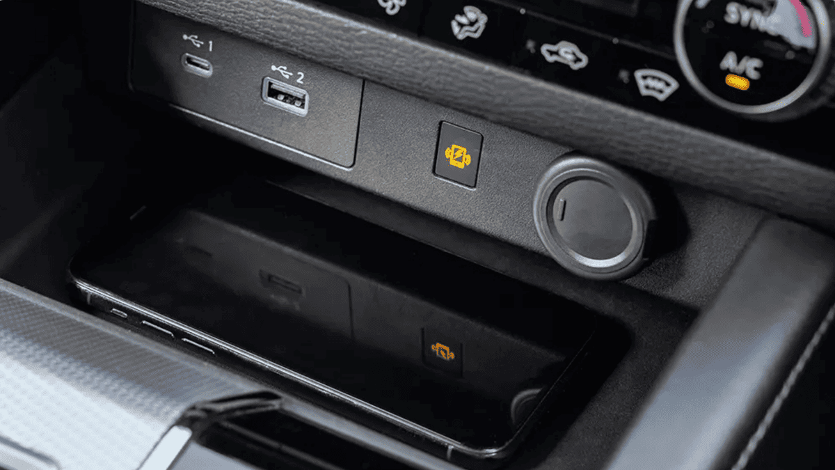 Close-up of wireless phone charging pad and USB ports in the 2024 Mitsubishi Outlander near Tampa, FL, showcasing tech convenience features.