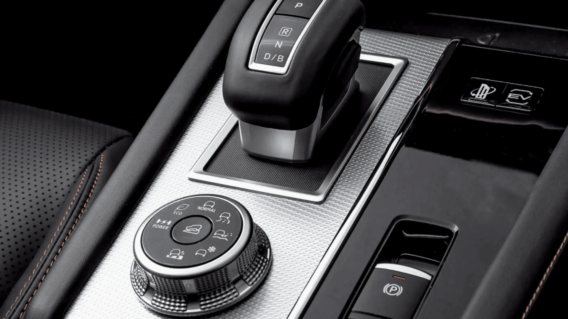 2025 Outlander PHEV gear shifter and terrain mode selector close-up