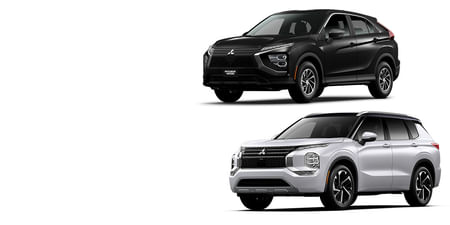 A silver Outlander and a blue Eclipse Cross on a white background.