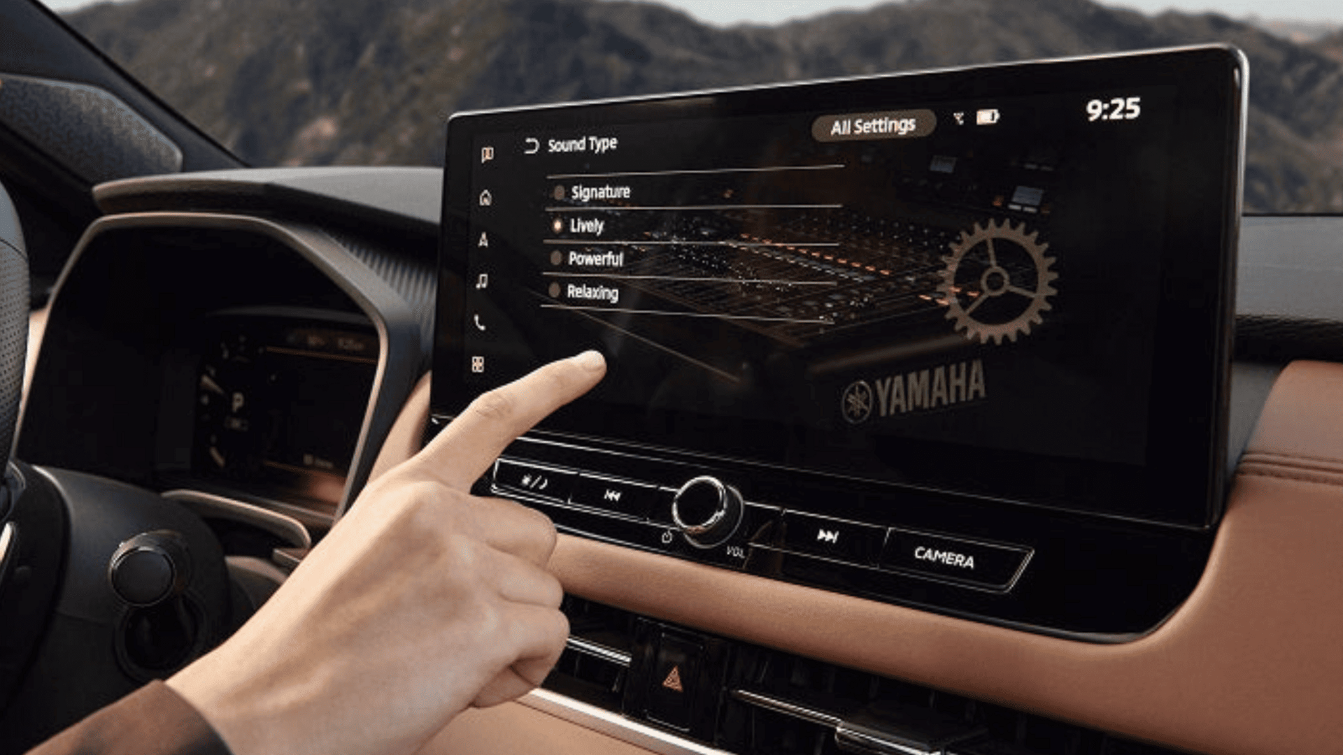 Premium black leather interior of 2025 Mitsubishi Outlander featuring quilted seats and panoramic sunroof