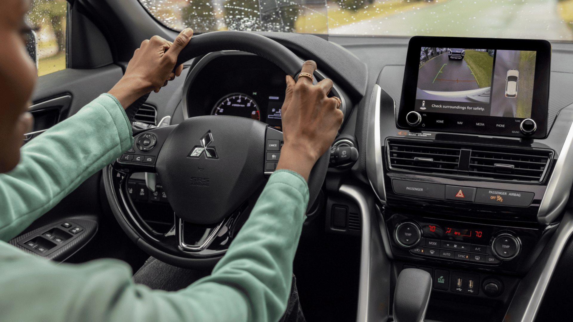 2025 Mitsubishi Eclipse Cross interior showing steering wheel and 360-view camera system in Brandon, FL