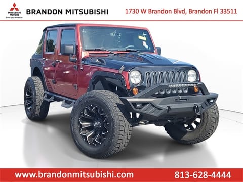 1 image of 2013 Jeep Wrangler Unlimited Sport