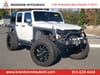 1 placeholder image of  2013 Jeep Wrangler Unlimited Sahara