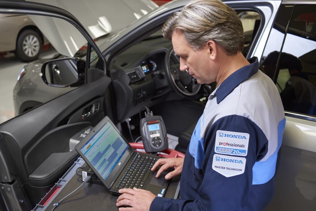 Service man with computer