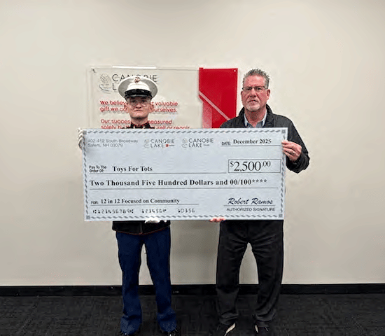 Banner of Toys for Tots donation.