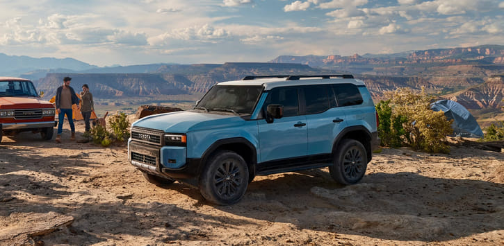 2025 Toyota Land Cruiser parked with the vast expanse of a canyon in the background.