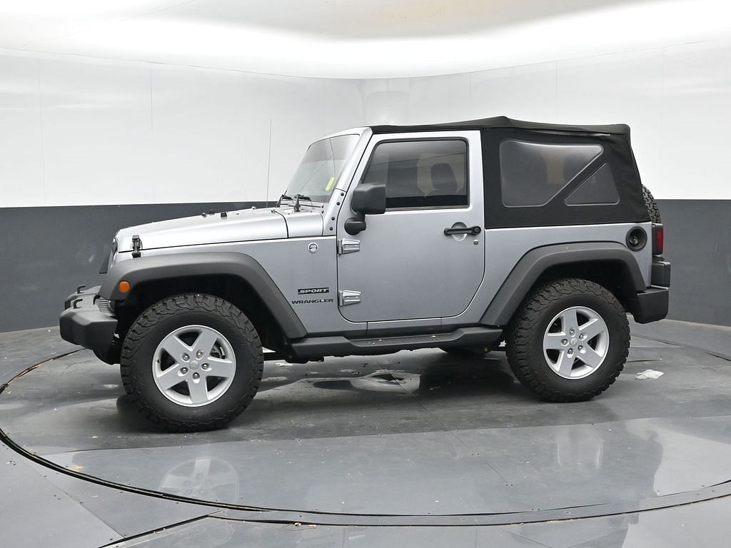 Used 2015 Jeep Wrangler Sport with VIN 1C4AJWAG3FL581503 for sale in Daphne, AL