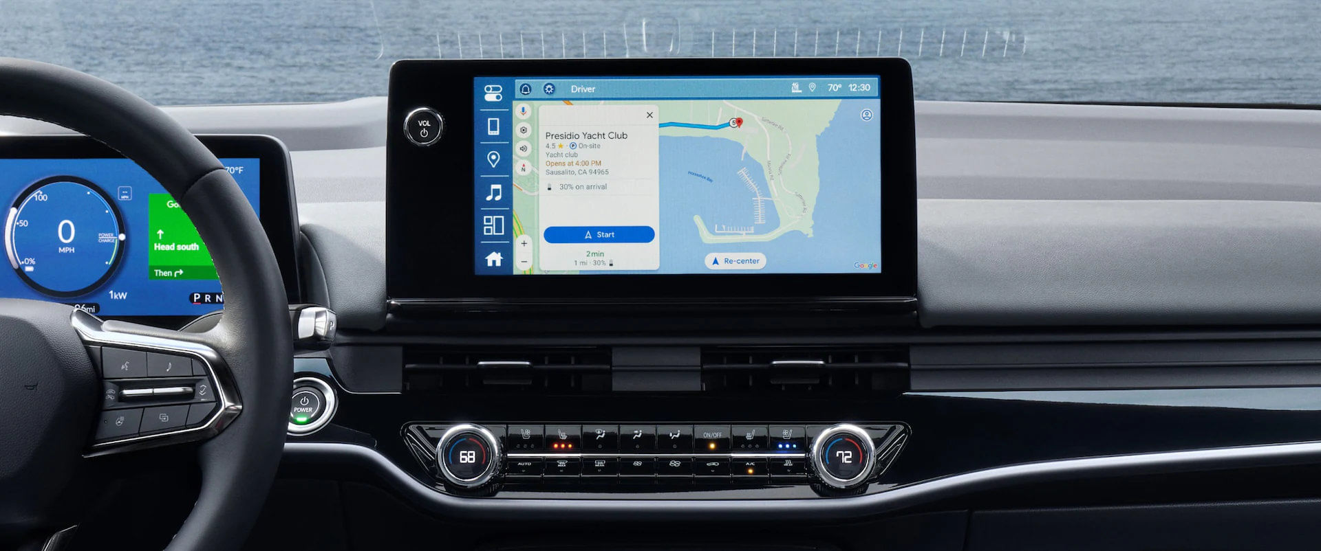 Close-up of the 2025 Honda Prologue's dashboard featuring the large central infotainment touchscreen displaying Google Maps navigation. The digital driver display and physical climate controls are also visible.