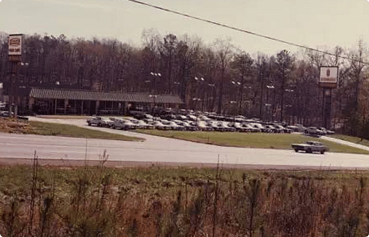 Vintage photo of Ed Voyles used car dealership.