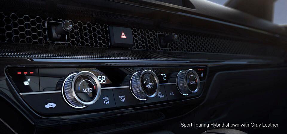 Air conditioning control panel in Honda Sport Touring Hybrid with Gray Leather interior