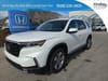 1 placeholder image of  2025 Honda Pilot EX-L AWD