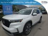 1 placeholder image of  2025 Honda Pilot Elite AWD