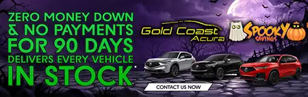 Halloween-themed Gold Coast Acura banner advertising zero money down, no payments for 90 days, and vehicles in stock, with three cars, a ghost, pumpkin, and spooky purple night sky.