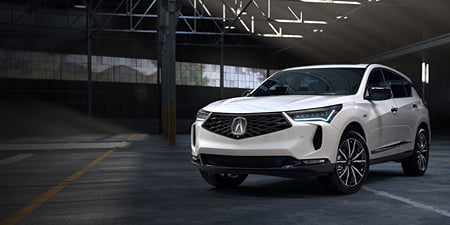 A white 2026 RDX parked in the production hall.