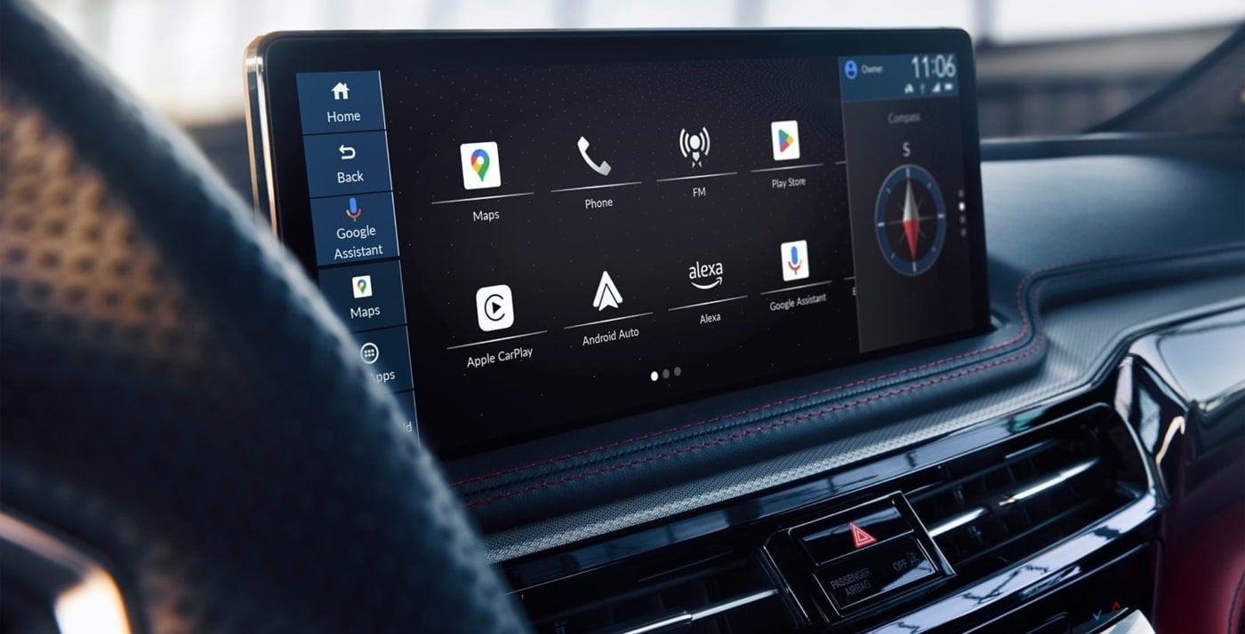 A close-up of a 2026 Acura MDX dashboard featuring a touchscreen infotainment system with navigation, phone, and app icons, including Google Assistant.