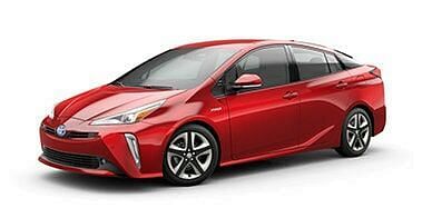 A light red Toyota Prius Hybrid