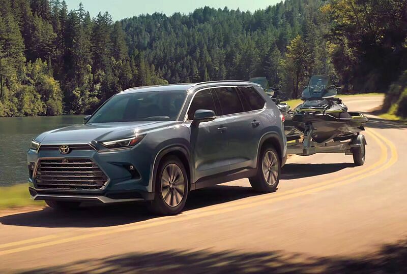 2024 Toyota Grand Highlander Hybrid towing a jet ski