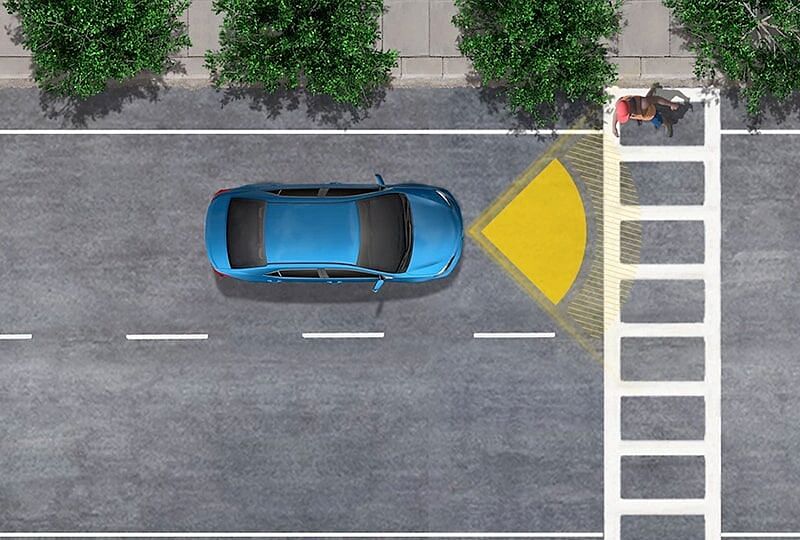 A car is in the driver's blind spot and the safety technology is notifying him