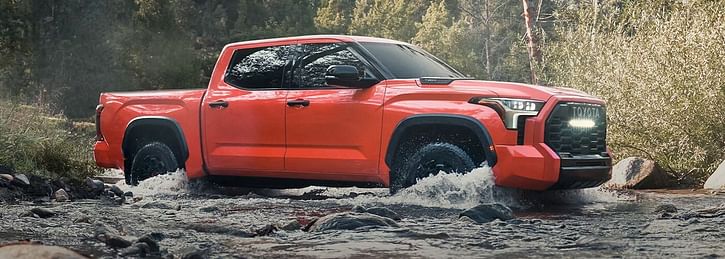 2023 Toyota Tundra i-FORCE MAX crossing a creek