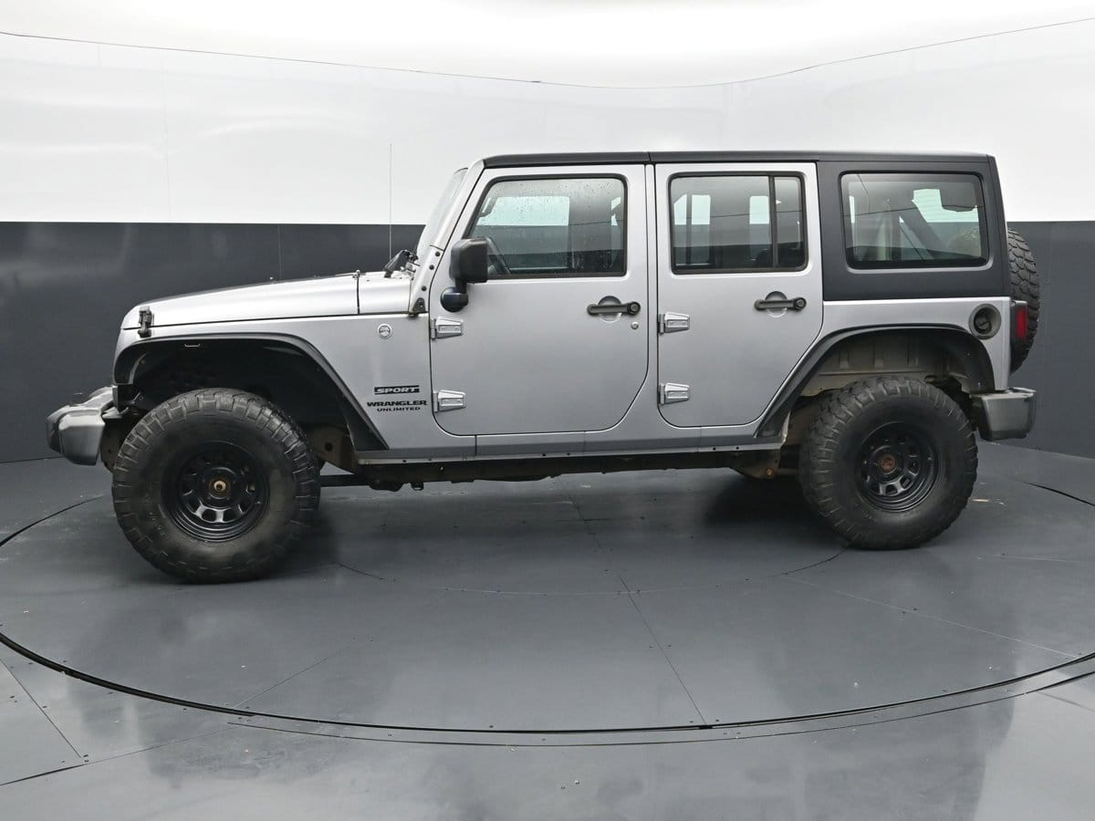 Used 2016 Jeep Wrangler Unlimited Sport with VIN 1C4BJWDG5GL251749 for sale in Scottsboro, AL