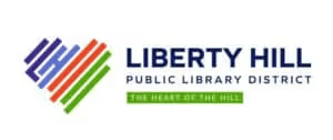Logo for Liberty Hill Public Library District features a multicolored, striped heart and the text 'LIBERTY HILL' with slogan 'THE HEART OF THE HILL.'
