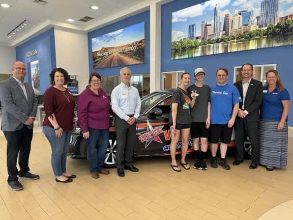 Event Winner with Staff