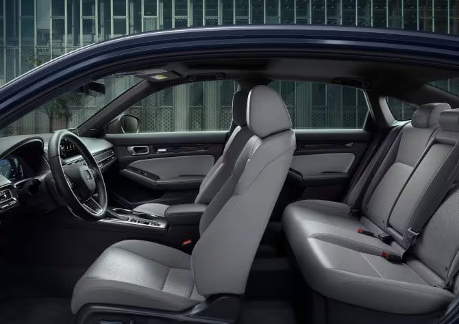 View of the inside of 2025 Honda Civic Hybrid looking up through the side doors.