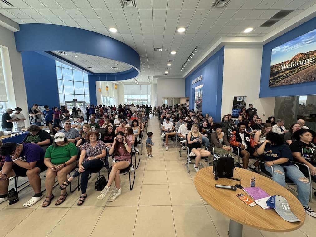 Showroom full of people