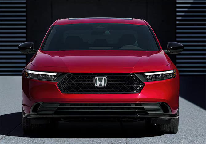 Front view of the 2025 Honda Accord showcasing its sleek grille and LED headlights, possibly in Solar Silver Metallic.