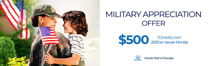 On the left, people in military uniforms holding babies in their arms. On the right text MILITARY APPRECIATION OFFER below Honda Mall of Georgia logo