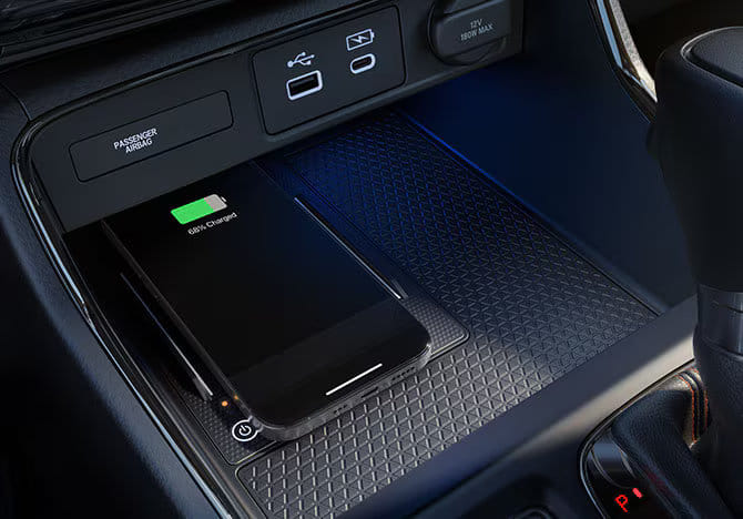 Used Honda CR-V wireless phone charging pad in use