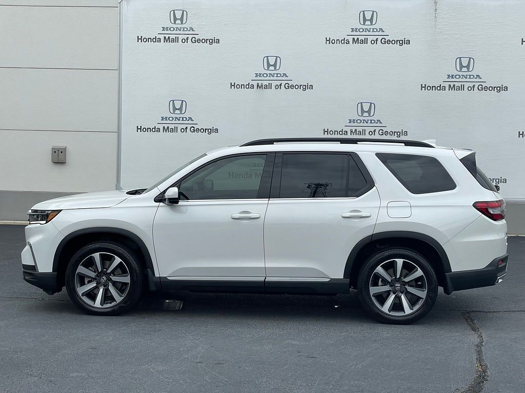Used 2023 Honda Pilot Elite with VIN 5FNYG1H88PB055936 for sale in Buford, GA