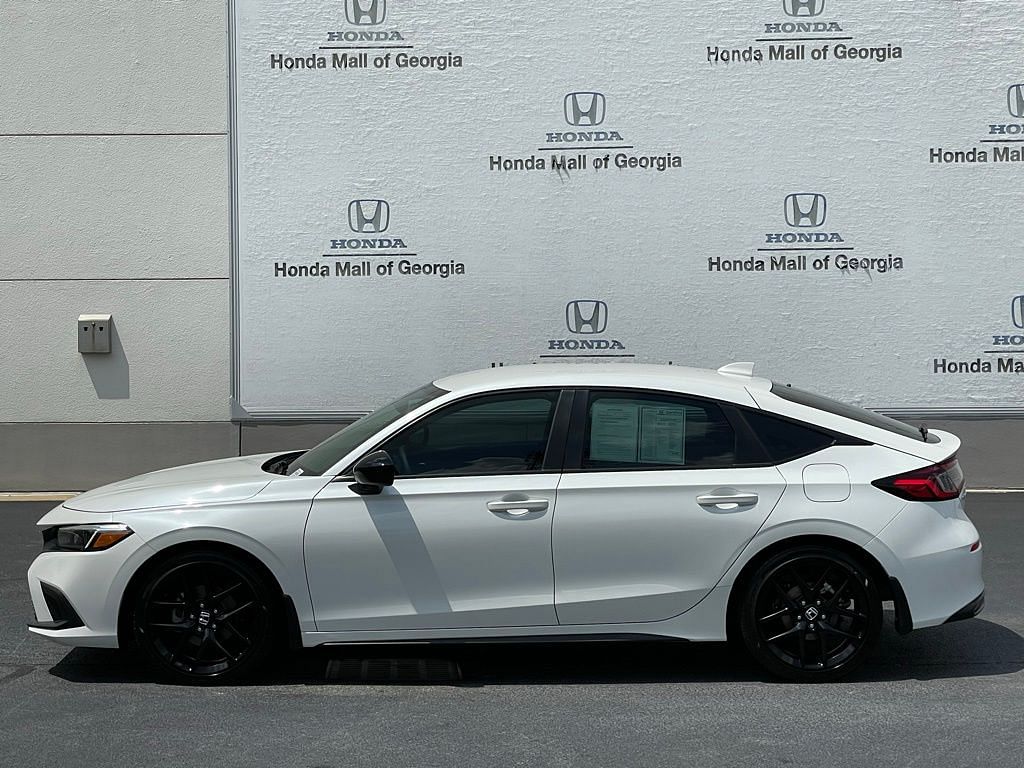 Used 2023 Honda Civic Hatchback Sport with VIN 19XFL2H85PE005574 for sale in Buford, GA