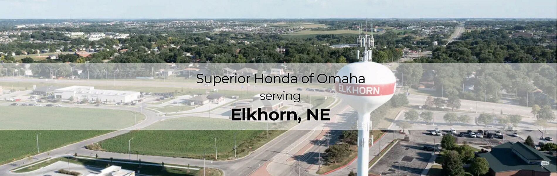 In the background weather tower with text in the front: Superior Honda of Omaha Serving Elkhorn NE