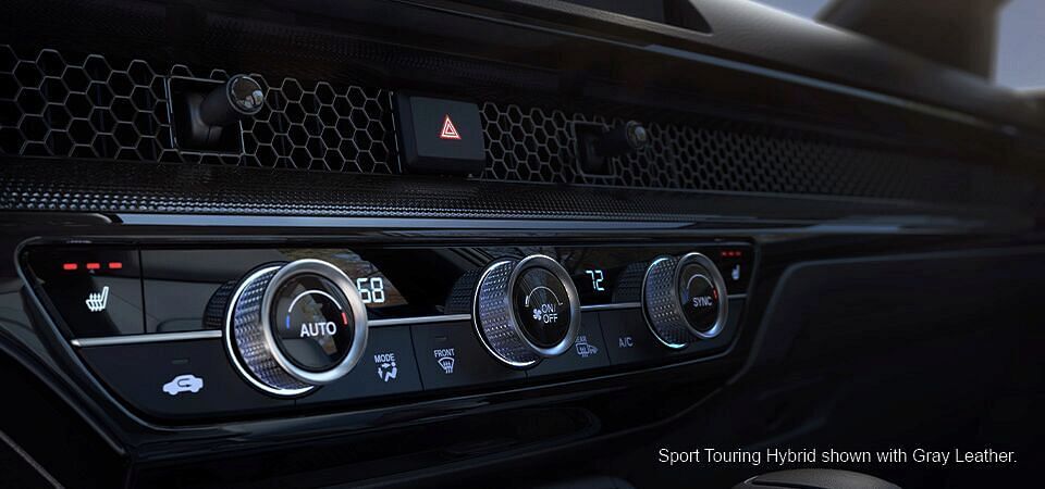 Air conditioning control panel in 2023 Honda Sport Touring Hybrid with Gray Leather interior