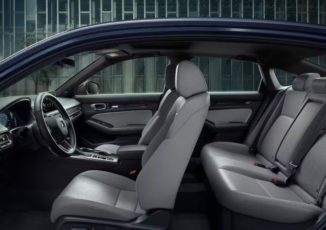 View of the inside of 2025 Honda Civic Hybrid looking up through the side doors.