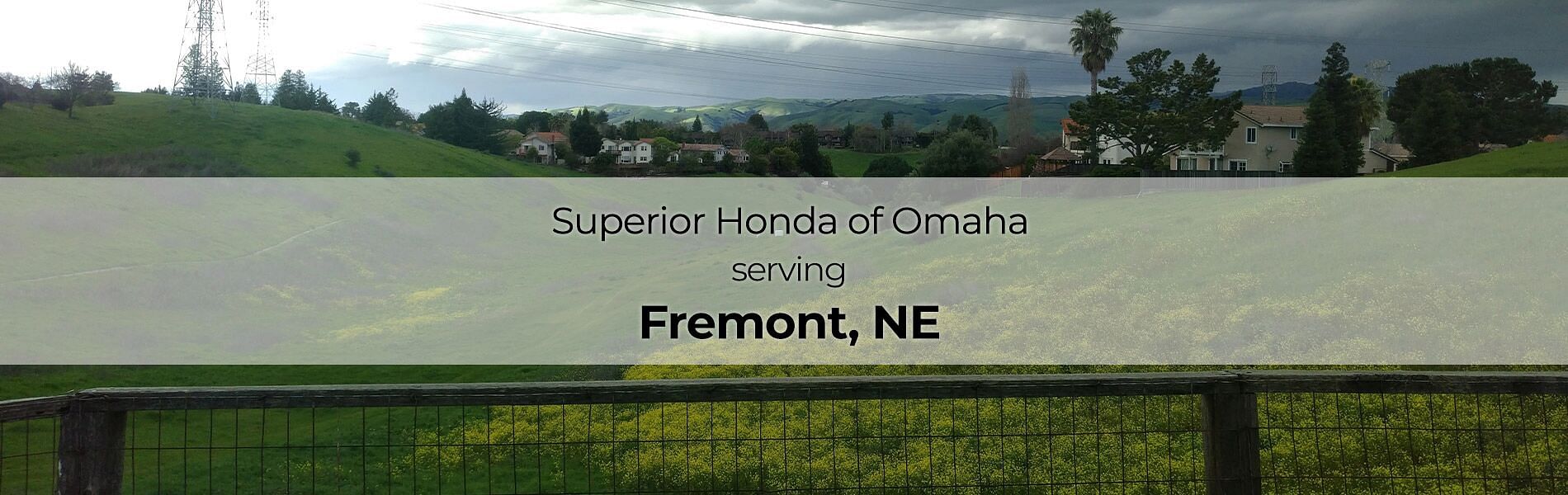 Village in the background with the inscription in front: Superior Honda of Omaha Serving Fremont, NE